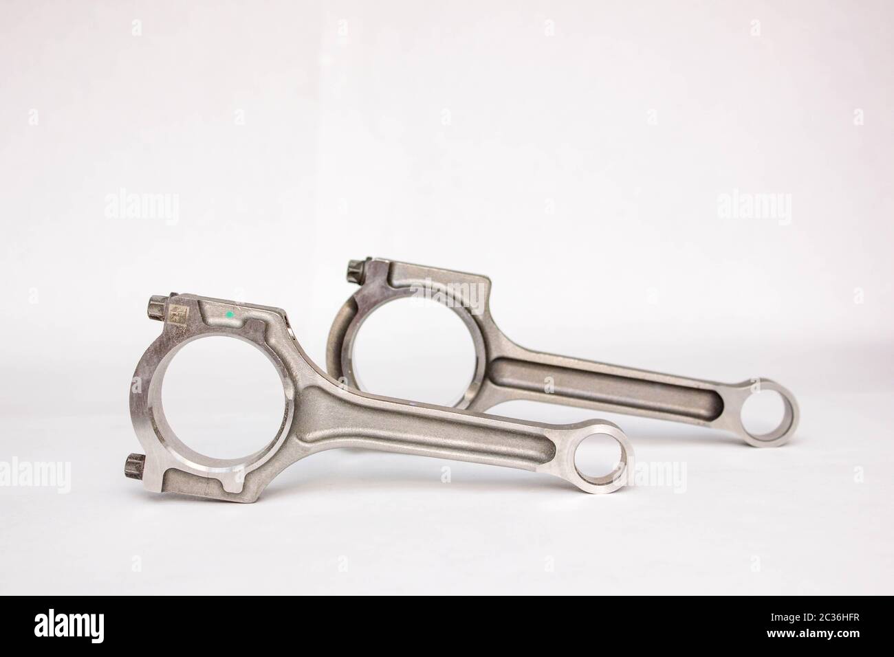 Connecting rod from a car engine isolated Stock Photo Alamy