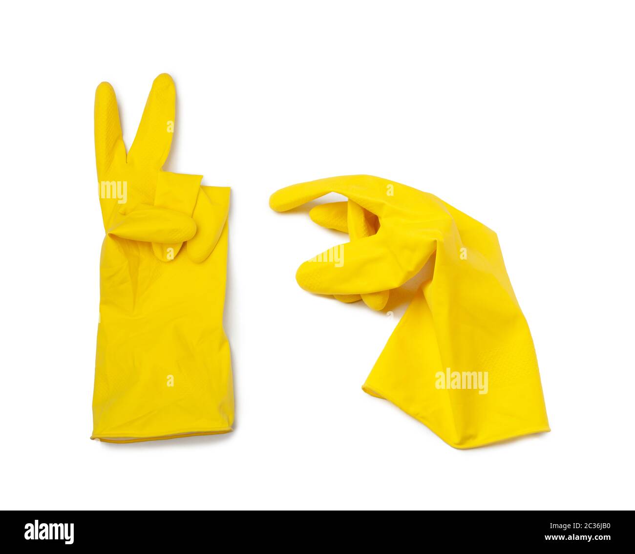Yellow rubber gloves for cleaning isolated on a white background Stock