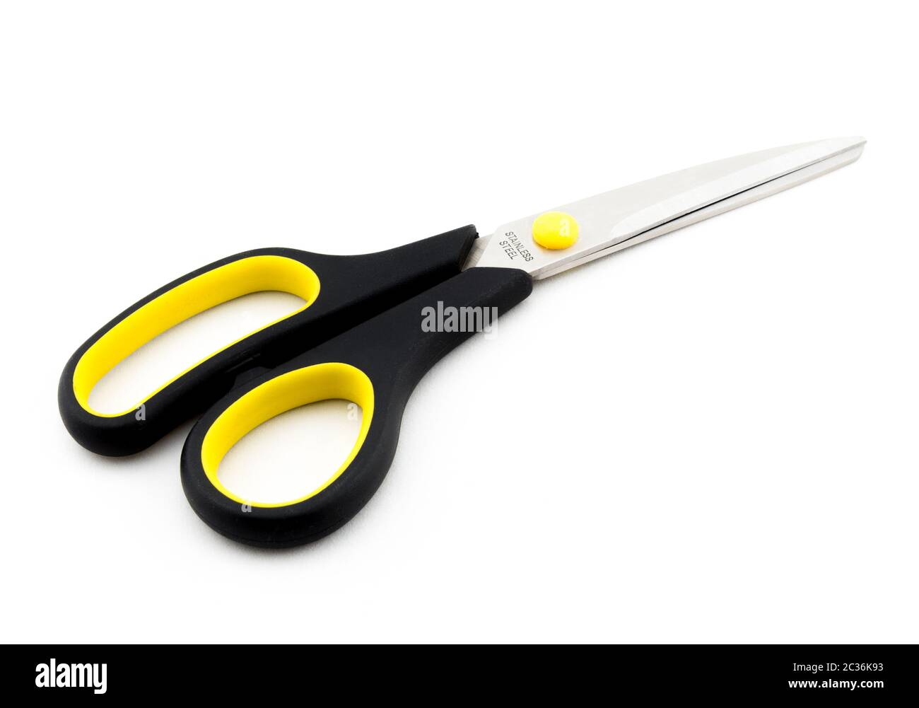 Black Scissors with yellow elements isolated on white background Stock Photo