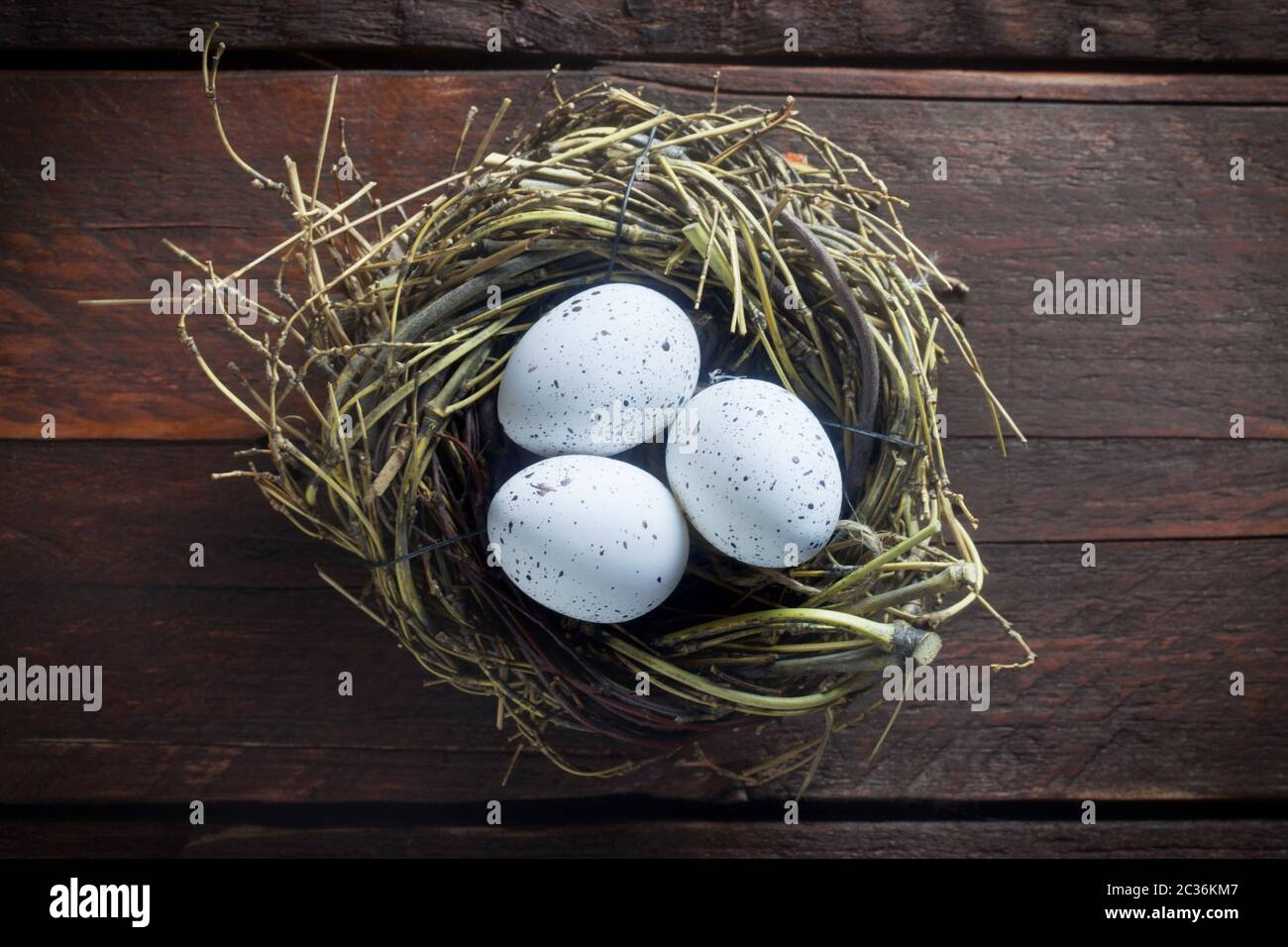 Easter Nest On A Wooden Background Stock Photo