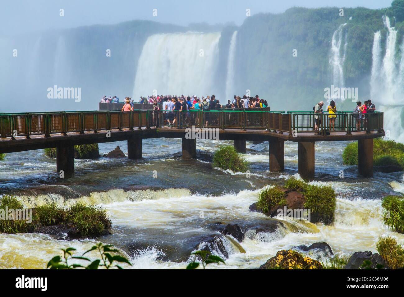 Tourists watch the waterfalls of Iguazu Stock Photo