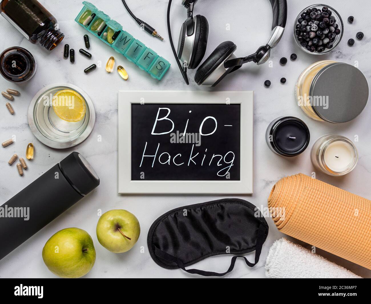 Biohacking flat lay concept. Top-down view of still life and word Bio Hacking on chalkboard Stock Photo