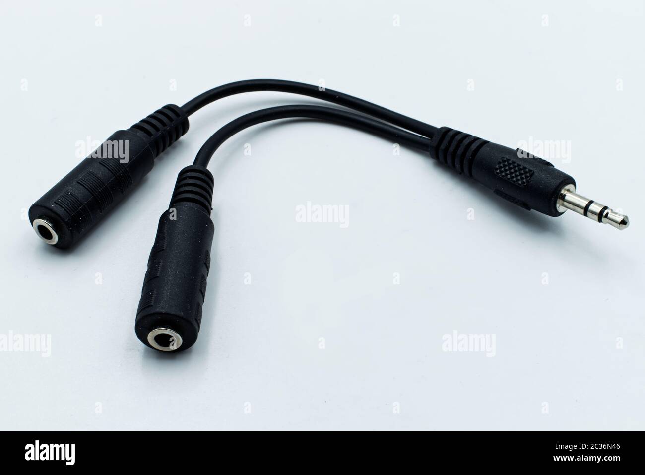 Audio cable splitter, stereo male to two female stereo audio jack 3,5 mm Stock Photo