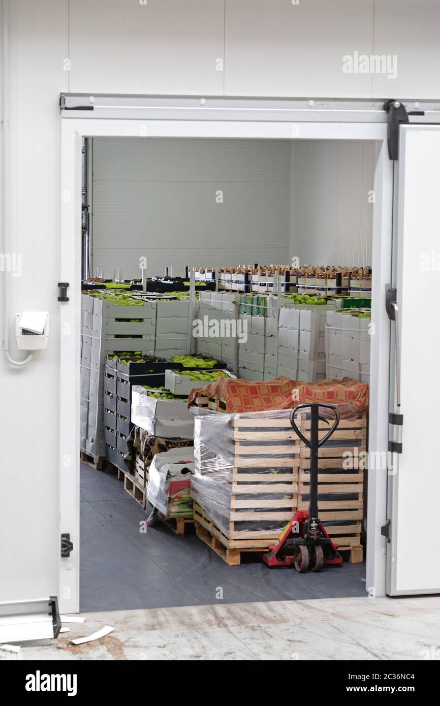 Pallet Jack Loaded With Crates in Food Storage Stock Photo Alamy