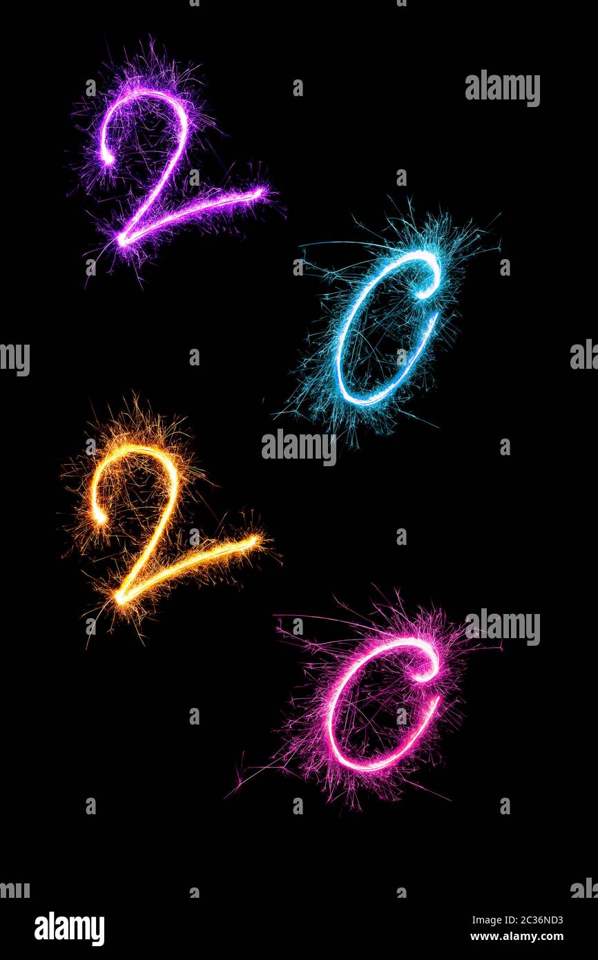 Happy new year. Digits 2020 made from fireworks isolated on black background. Stock Photo