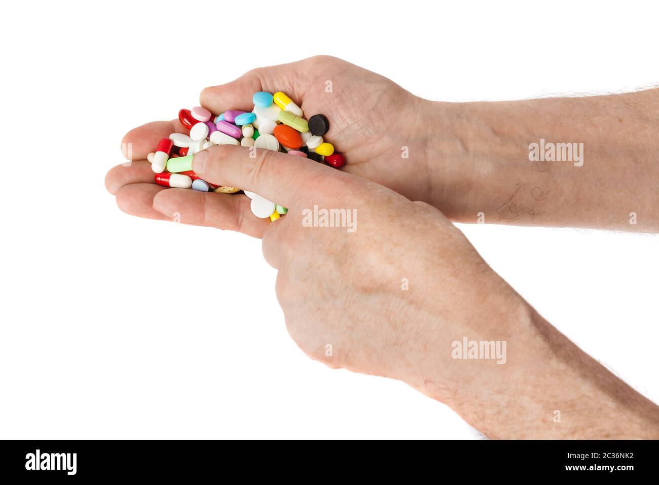Hands with pills Stock Photo