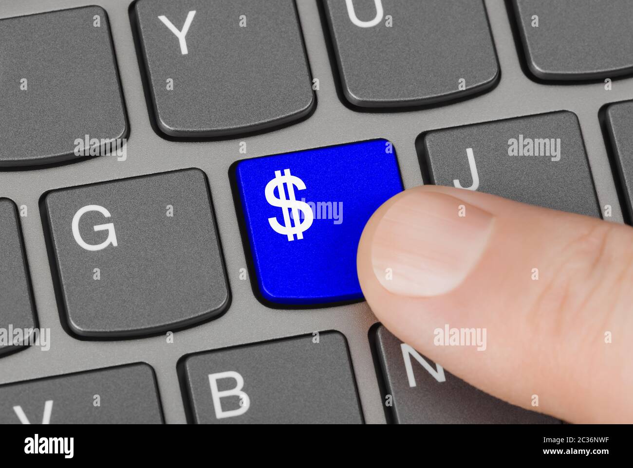 Computer keyboard with money key Stock Photo