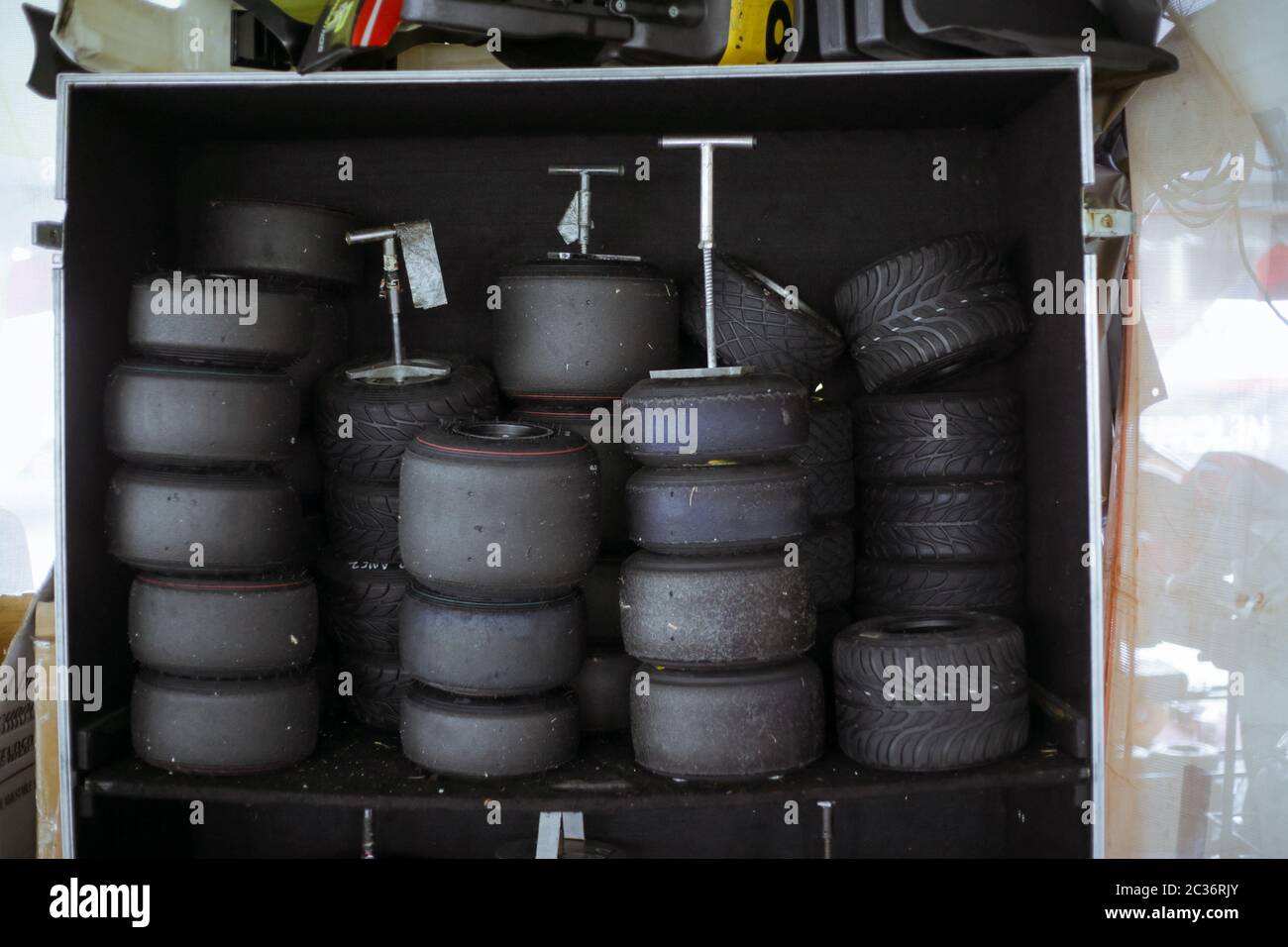 Spare kart tyres storage at a on-site workshop. Stock Photo