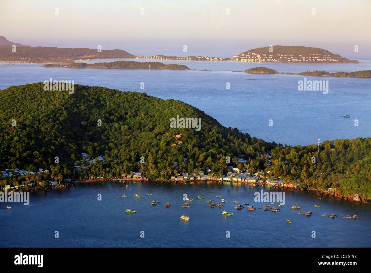 Aerial top view small boats in the bay blue water Stock Photo - Alamy