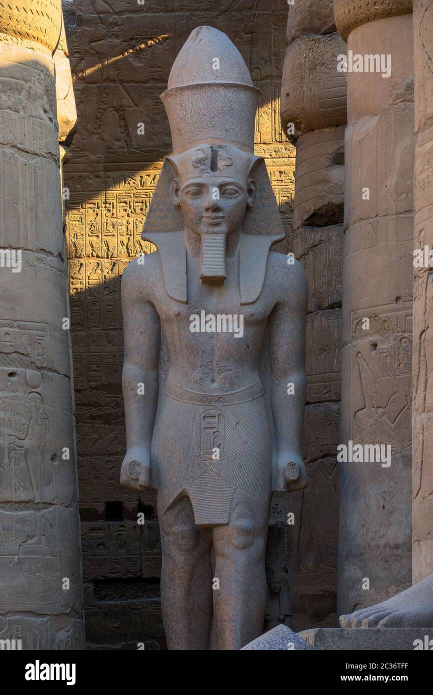 Statue of Pharaoh in Luxor temple Stock Photo - Alamy