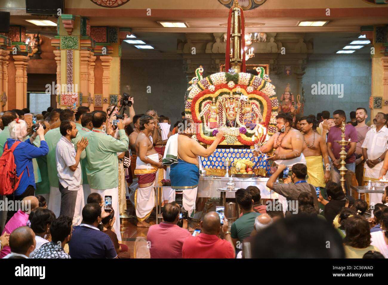 Priests doing the initiation ceremony for Thaipusam procession at Sri Maha Mariamman Temple, Kuala Lumpur, Malaysia Stock Photo
