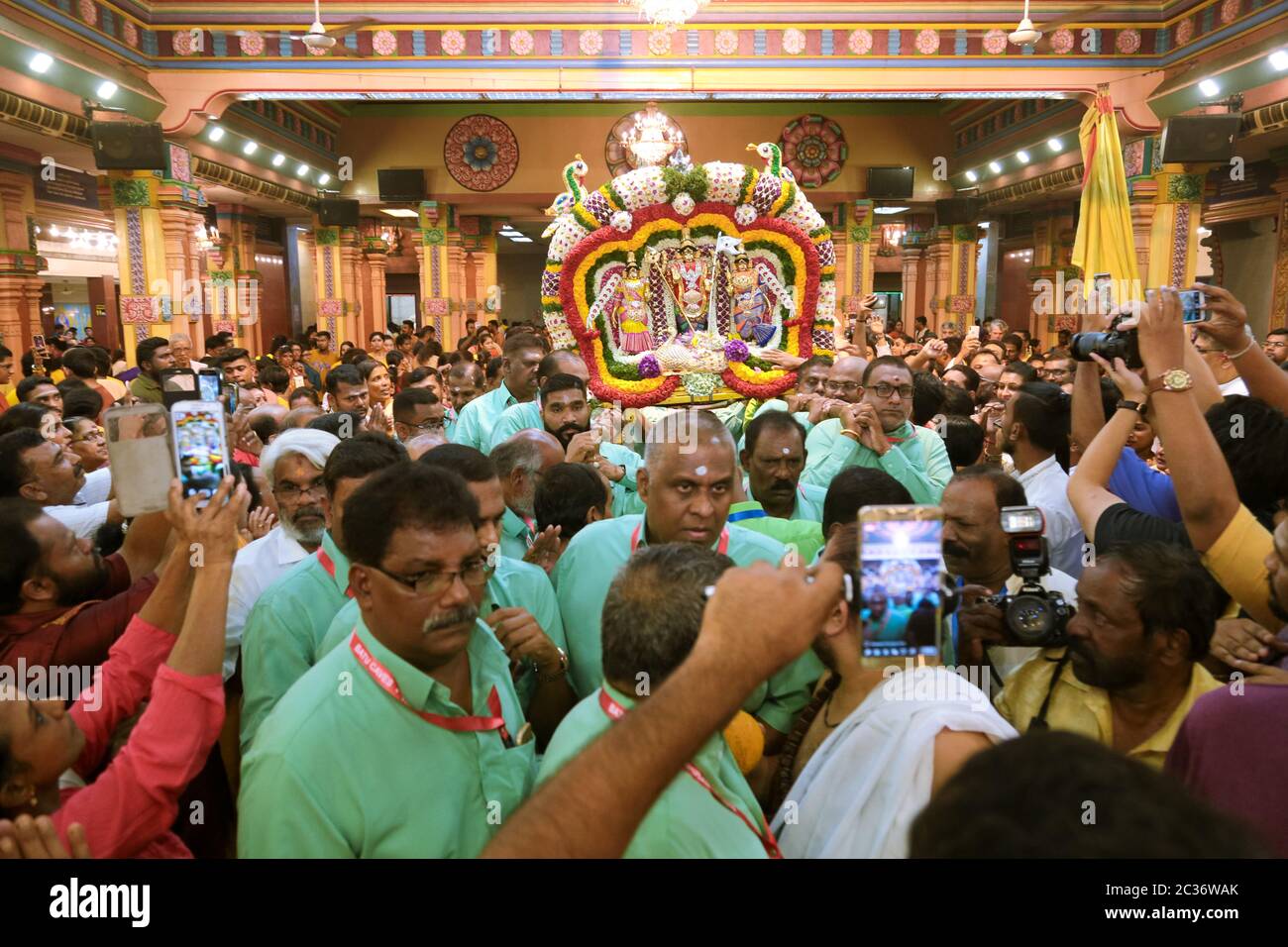 Crowd gather at Sri Maha Mariamman Temple, Kuala Lumpur, Malaysia to witness the initiation of Thaipusam chariot procession. Stock Photo
