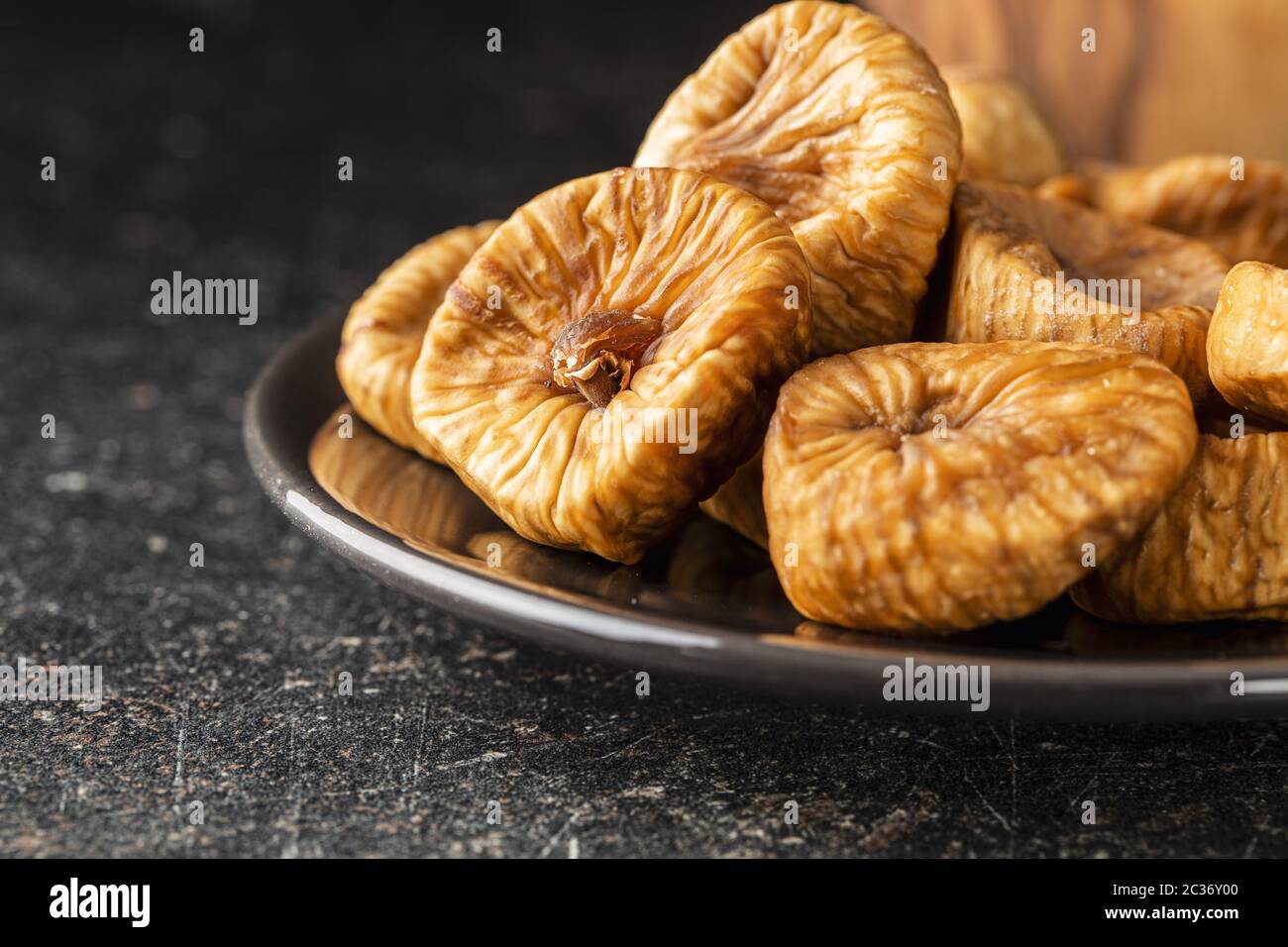 Sweet dried figs on plate. Stock Photo
