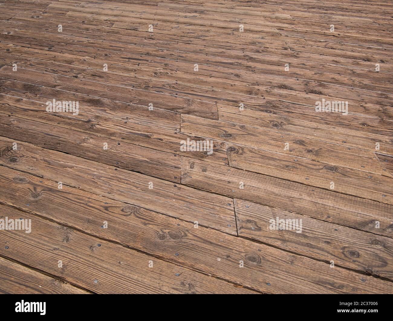 Wooden boards fixed to a jetty with steel nails Stock Photo - Alamy