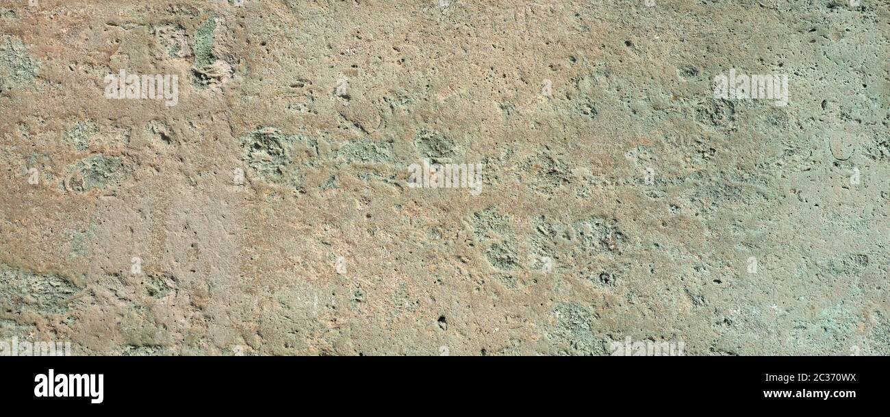 wide grey stone wall useful as a background Stock Photo - Alamy