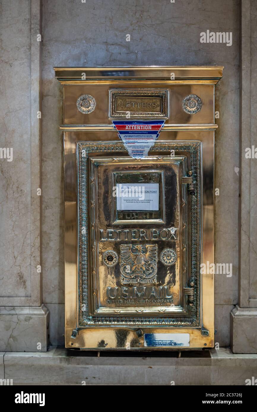 NEW YORK, USA - NOVEMBER 18, 2019:  Ornate brass US Mail Letterbox Stock Photo