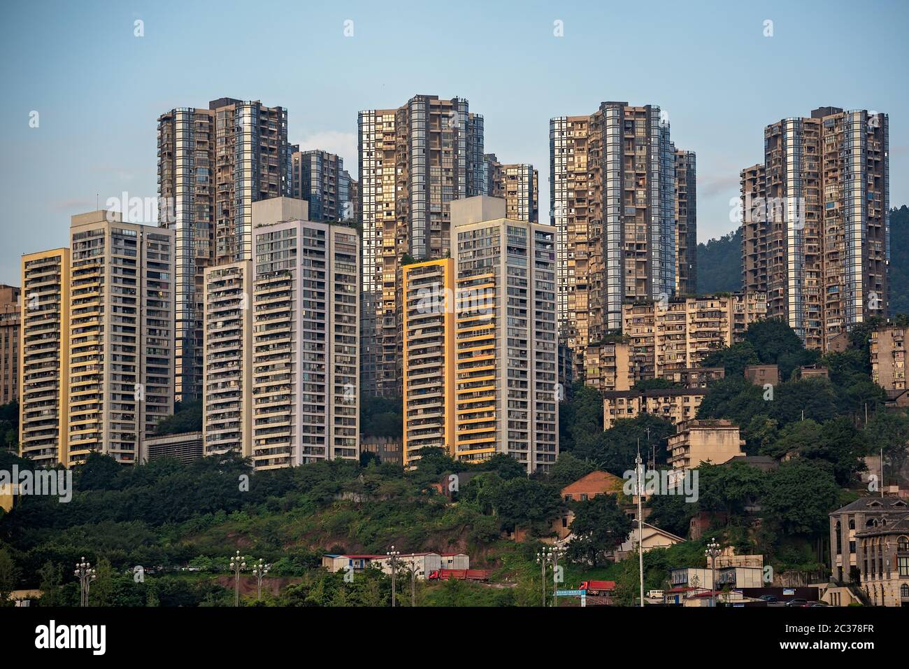 Chongqing, China - August 2019 : Panoramic view of the highrise residential and commercial buildings on the shore of Yangtze river Stock Photo