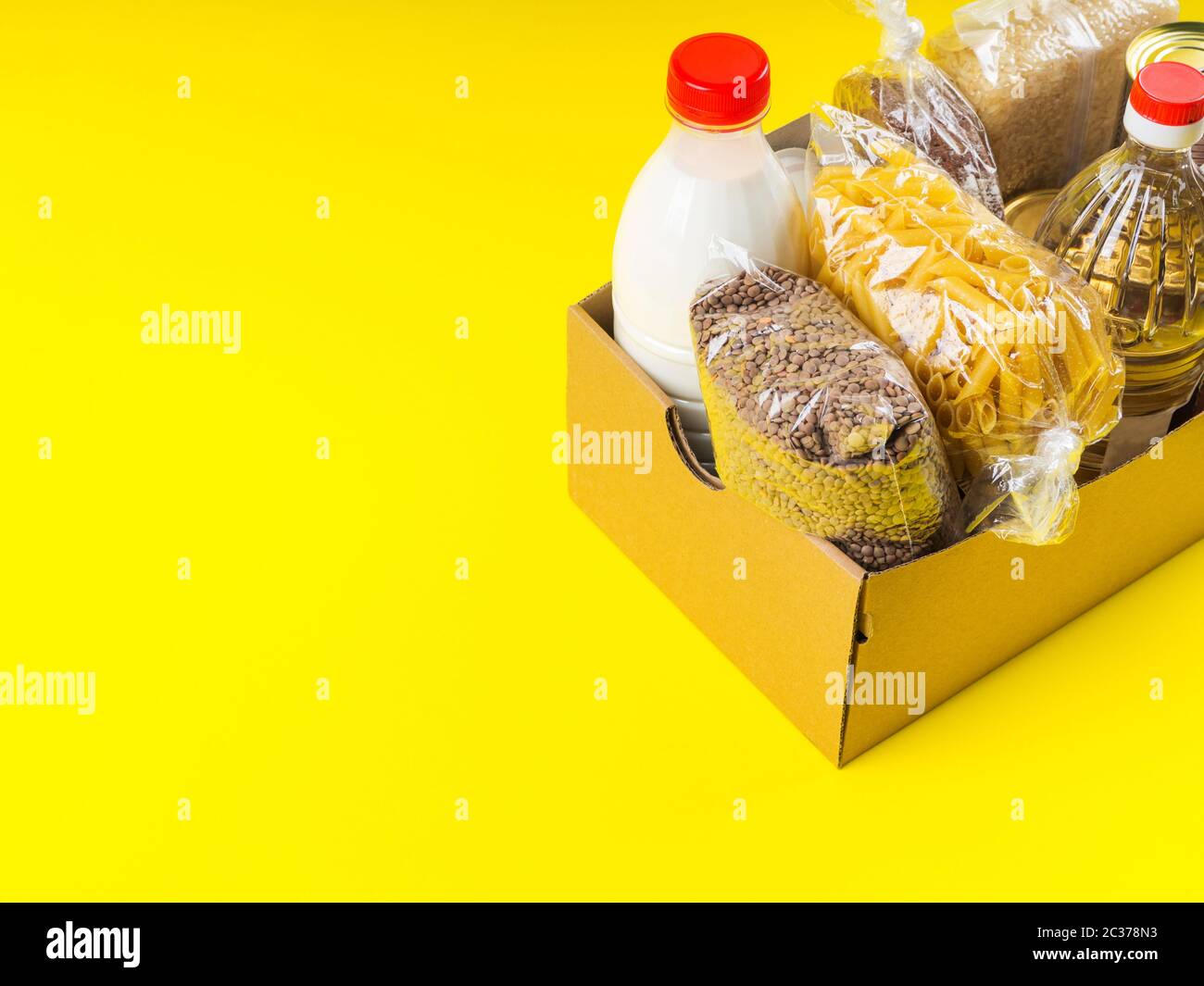 Food staples delivery or donation box concept Stock Photo Alamy
