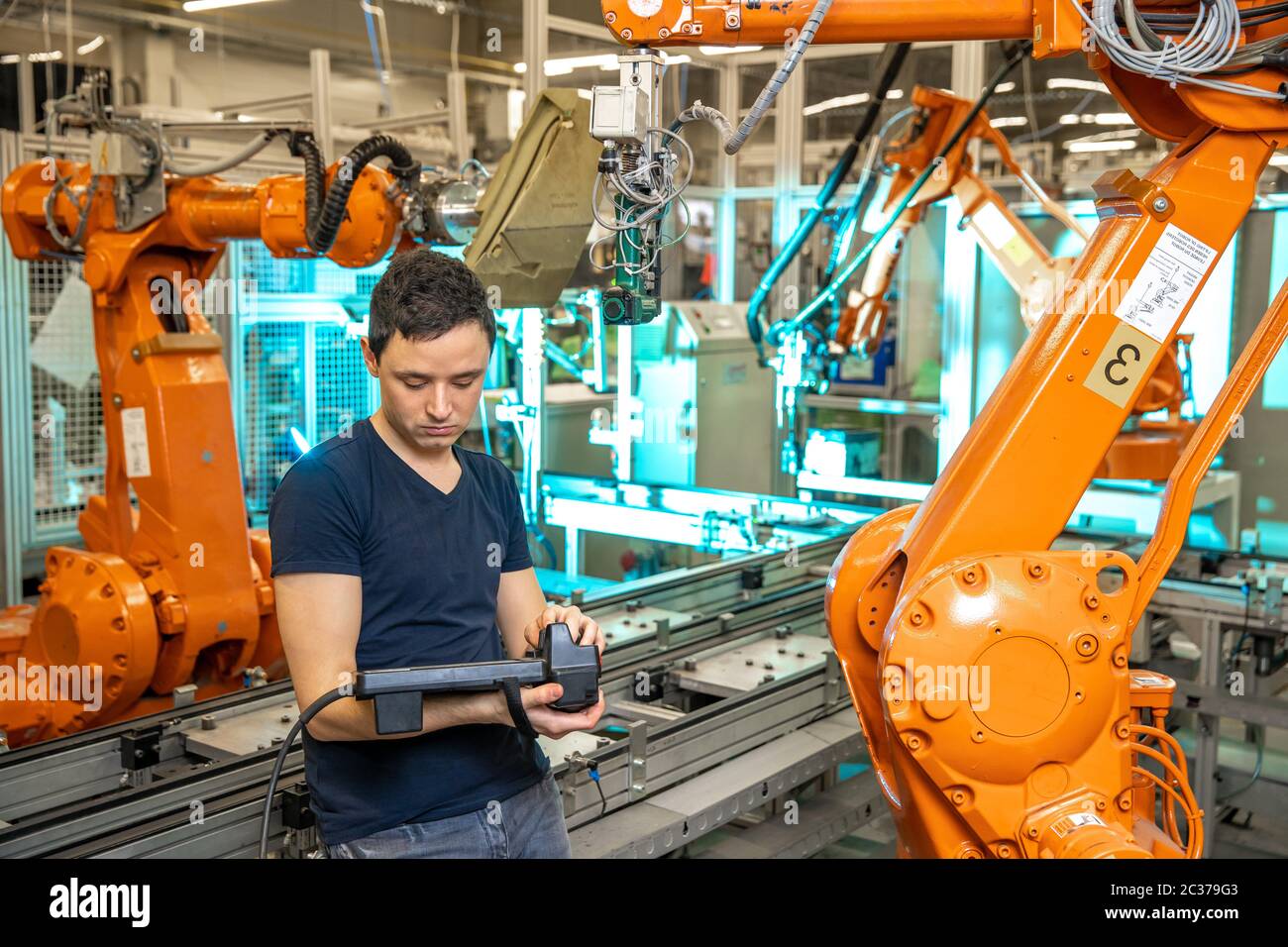 robot diagnostics using special software in the factory. Stock Photo