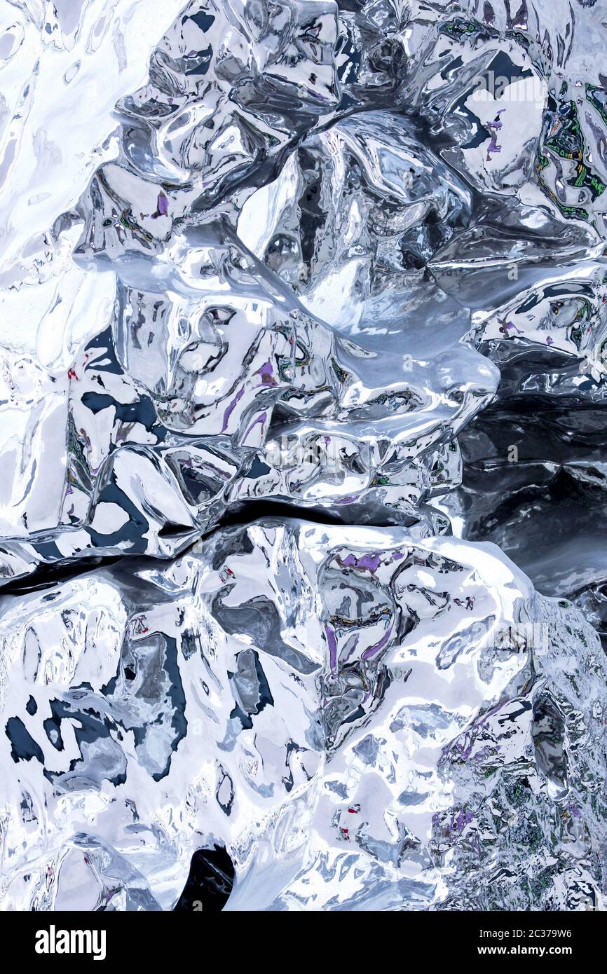 Abstract liquid like silver metal background vertical Stock Photo - Alamy