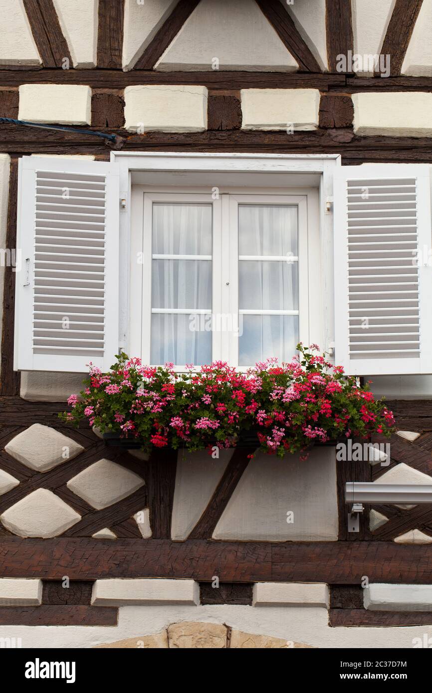 Window of a house in Eguisheim, Alsace, France Stock Photo