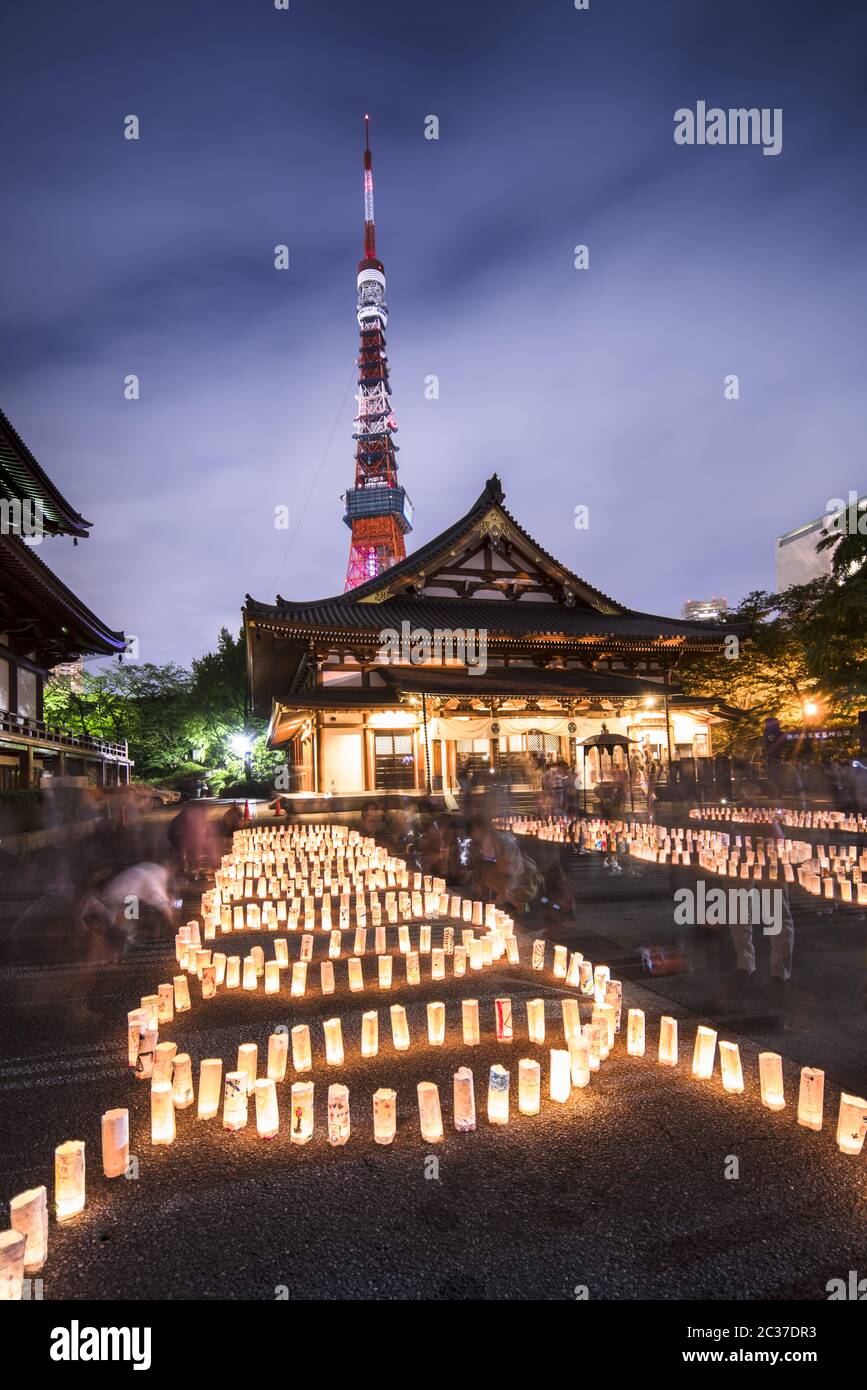 Handmade japanese rice paper lanterns aligned in circles illuminating the ground of the Zojoji templ Stock Photo