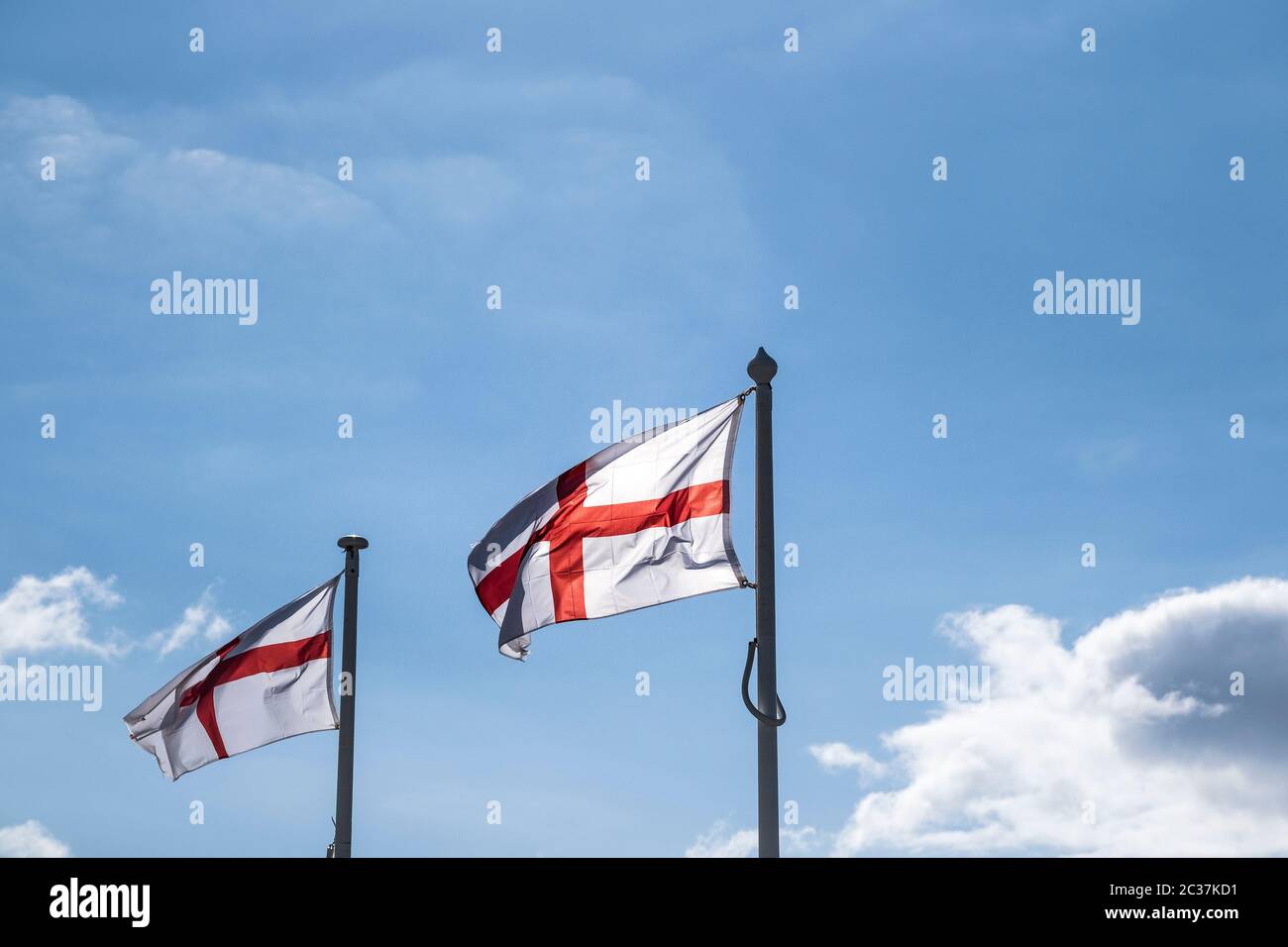Flags of the Cross of St George fluttering in the wind. Stock Photo