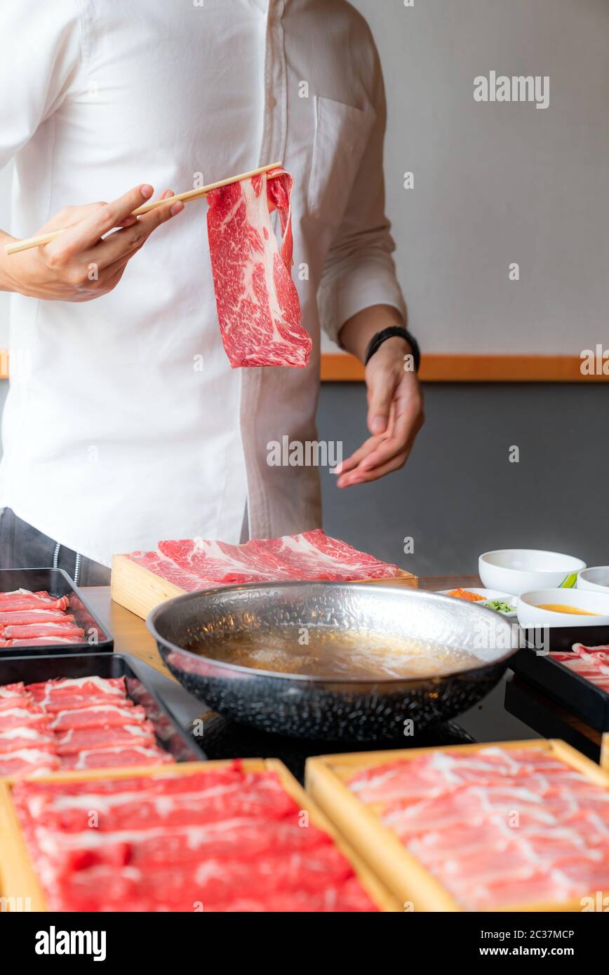 Cooking of japanese wagyu beef Shabu Shabu set hot pot Stock Photo Alamy