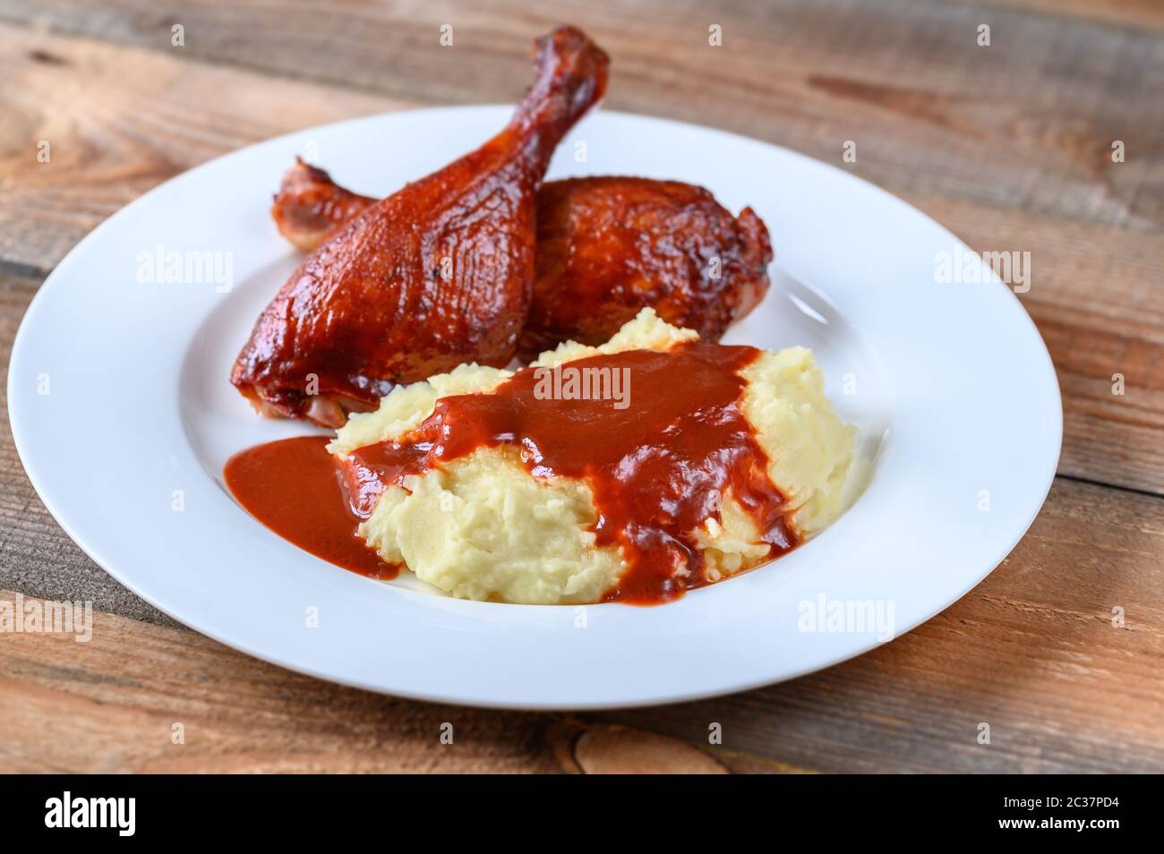 Barbecue duck legs with mashed potato closeup Stock Photo Alamy