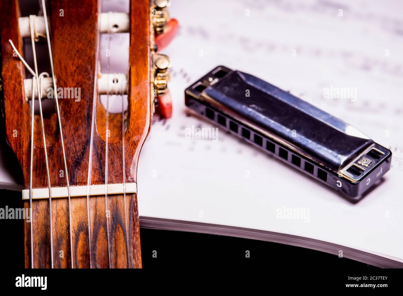 guitar and harmonica with notes Stock Photo