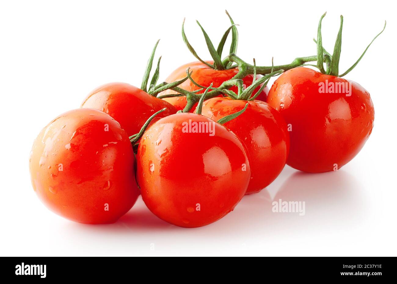 Bunch of ripe red tomatoes isolated on white background Stock Photo - Alamy