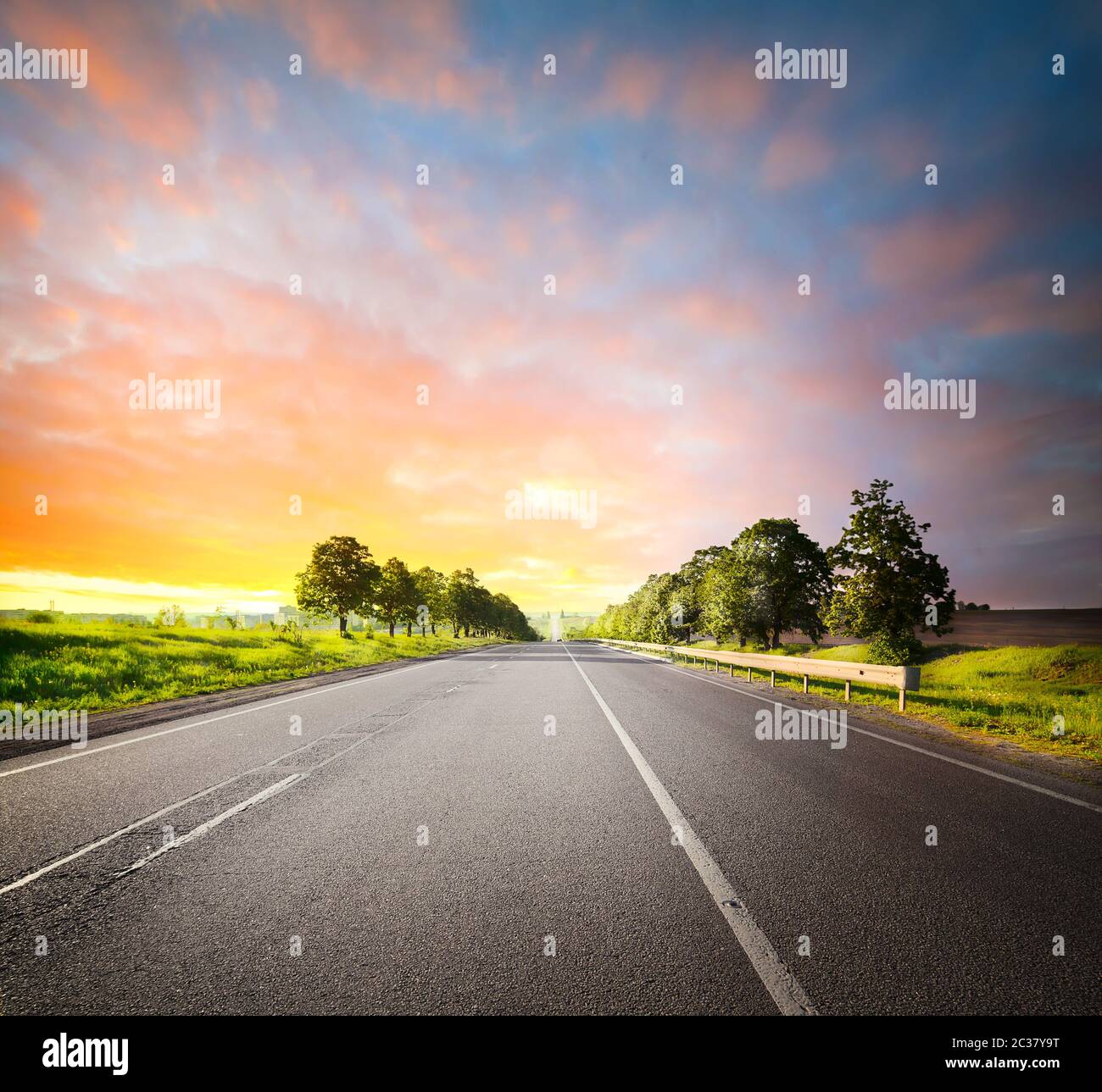 Landscape with asphalt road among fields under a dramatic sky Stock ...