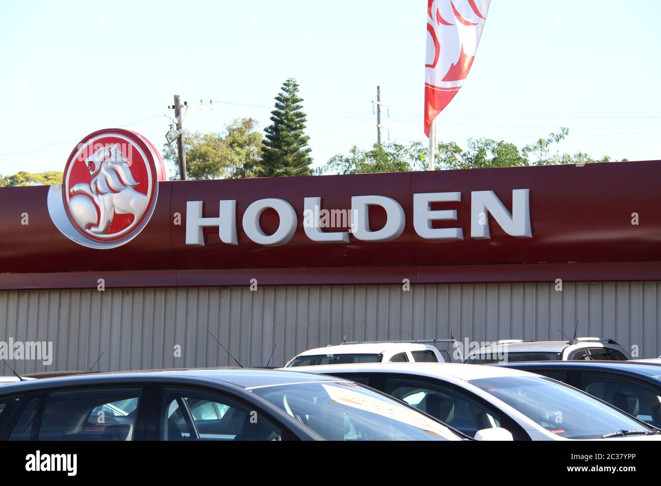 The Holden logo and name at Holden Suttons car sales dealership at 112