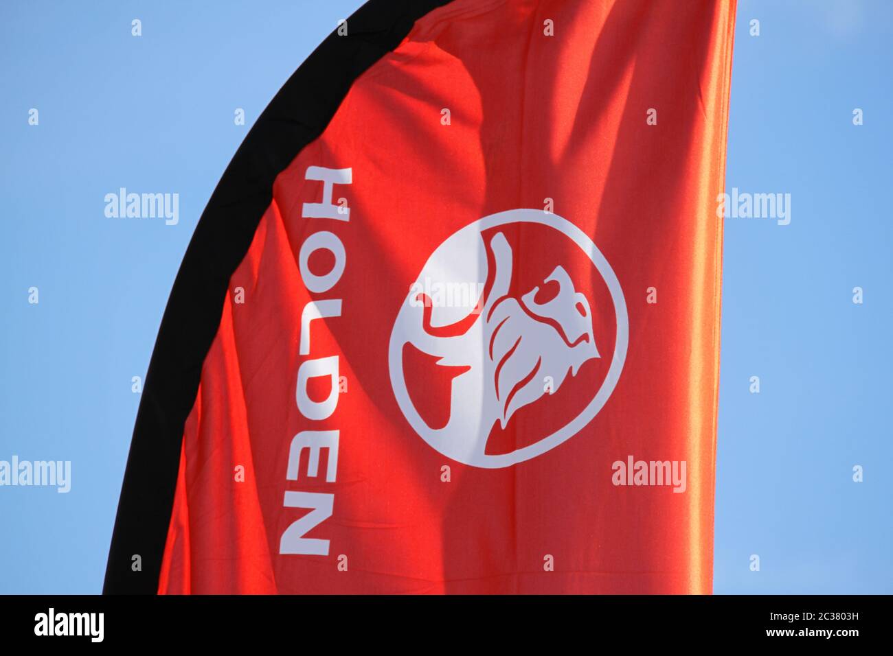 The Holden logo and name on a banner at Holden Suttons car sales