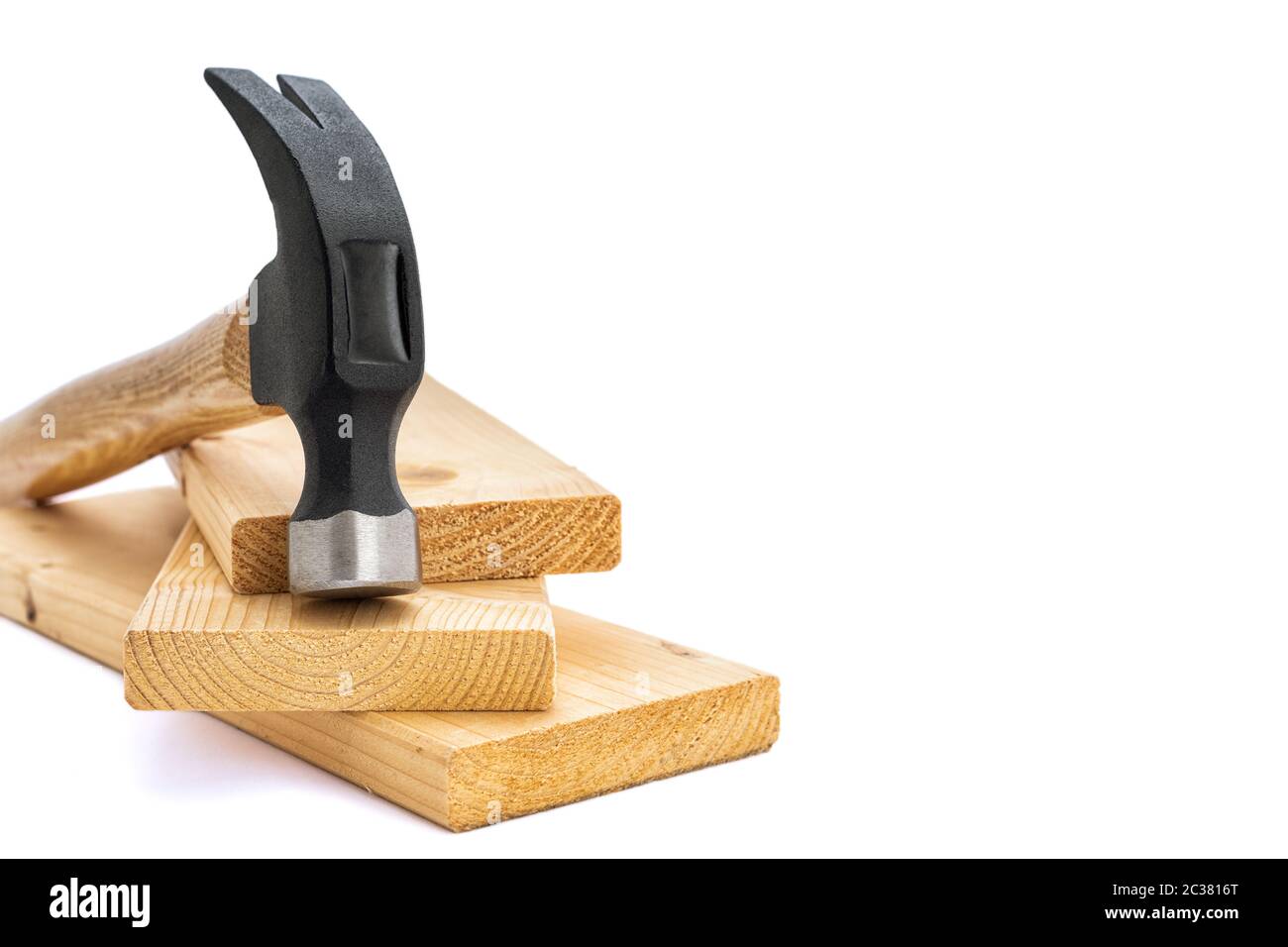 Closeup of a carpenter's hammer on white background. Construction