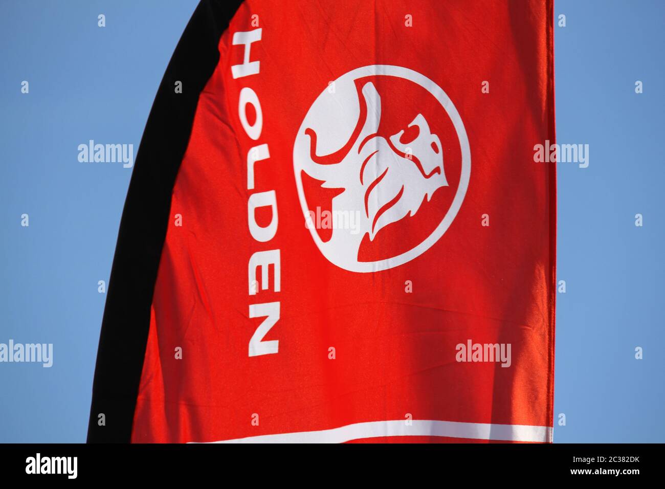 The Holden company logo and name on a banner at Holden Suttons car