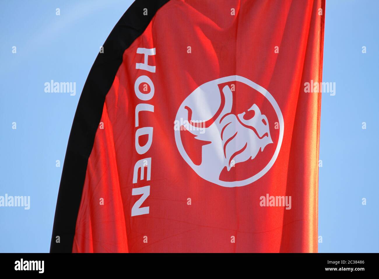 The Holden company logo and name on a banner at Holden Suttons car