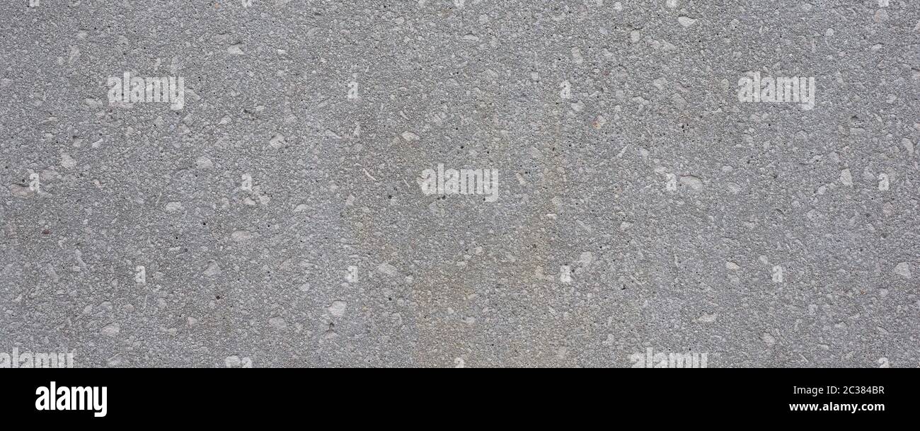 grey stone wall useful as a background Stock Photo - Alamy
