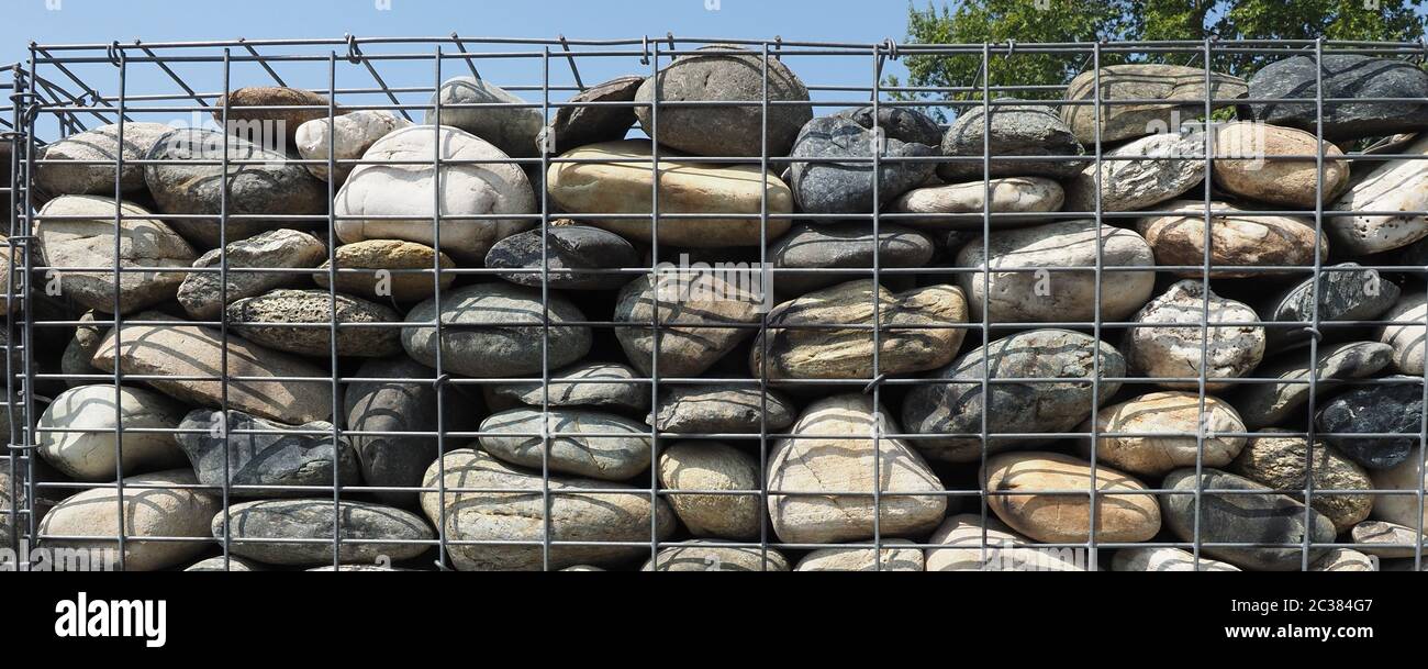 wide stone wall texture useful as a background Stock Photo - Alamy