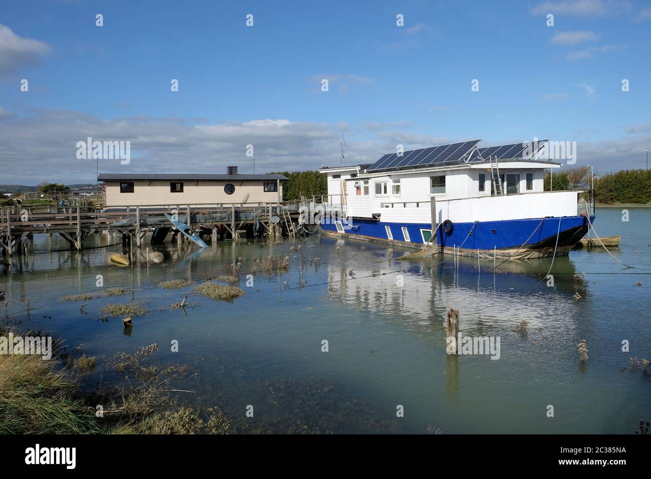 Houseboats at Riverbank on the River Adur, Shoreham, Brighton Stock Photo