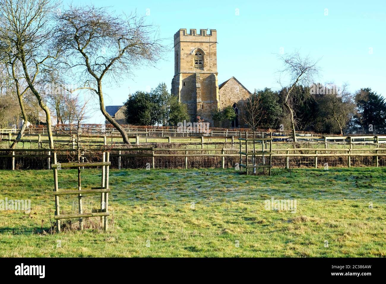 St Martin, Church of England Church, Barcheston, Shipston-on-Stour, Warwickshire.  Winter view, taken across fields. Stock Photo