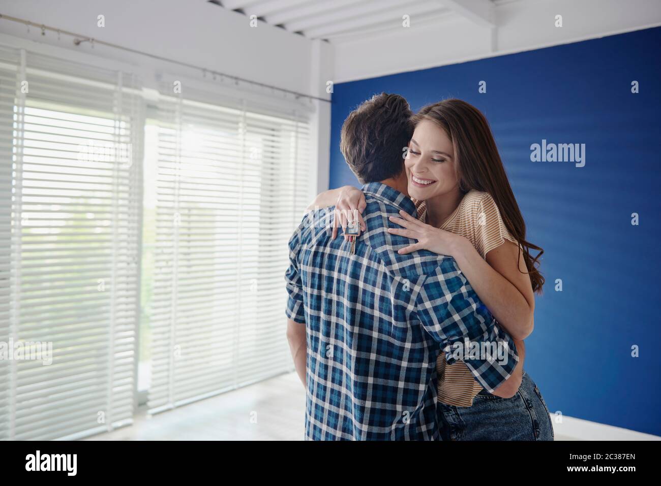 Young couple finally bought a dreamy house Stock Photo