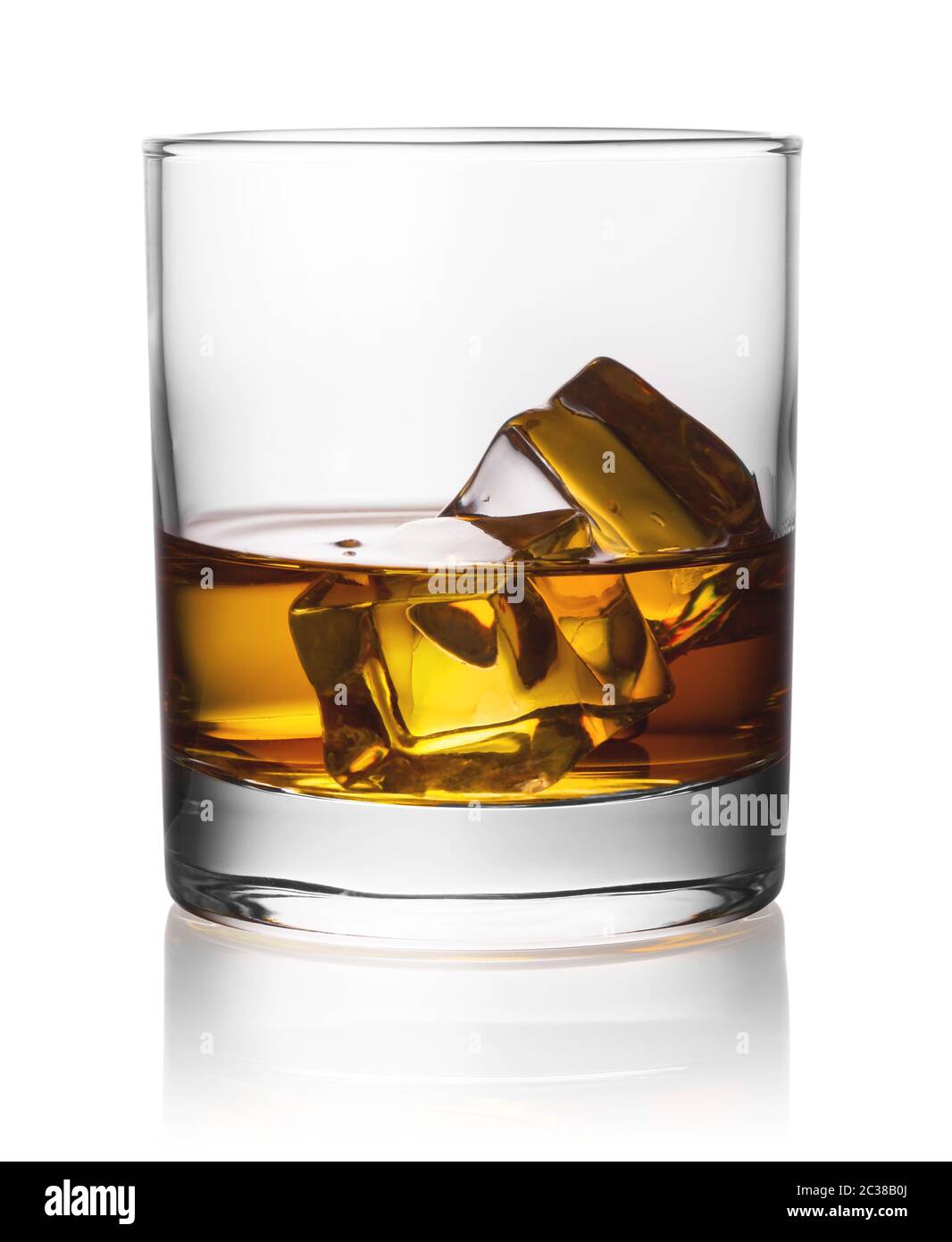 Round transparent glass of whiskey with ice isolated on white