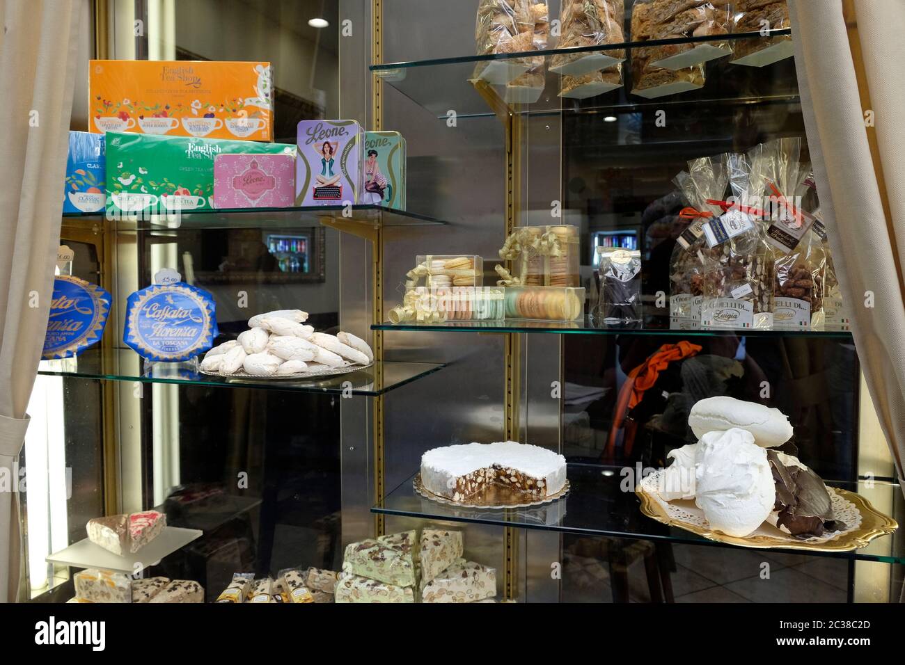 Shop window in Florence displaying speciality sweets. Stock Photo