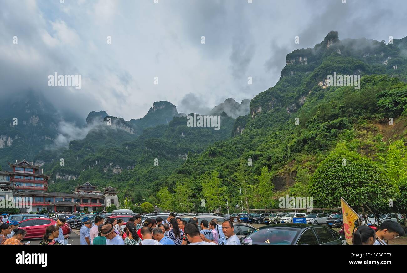 Massive tourist crowds at the entrance to Zhangjiajie National Park Stock Photo