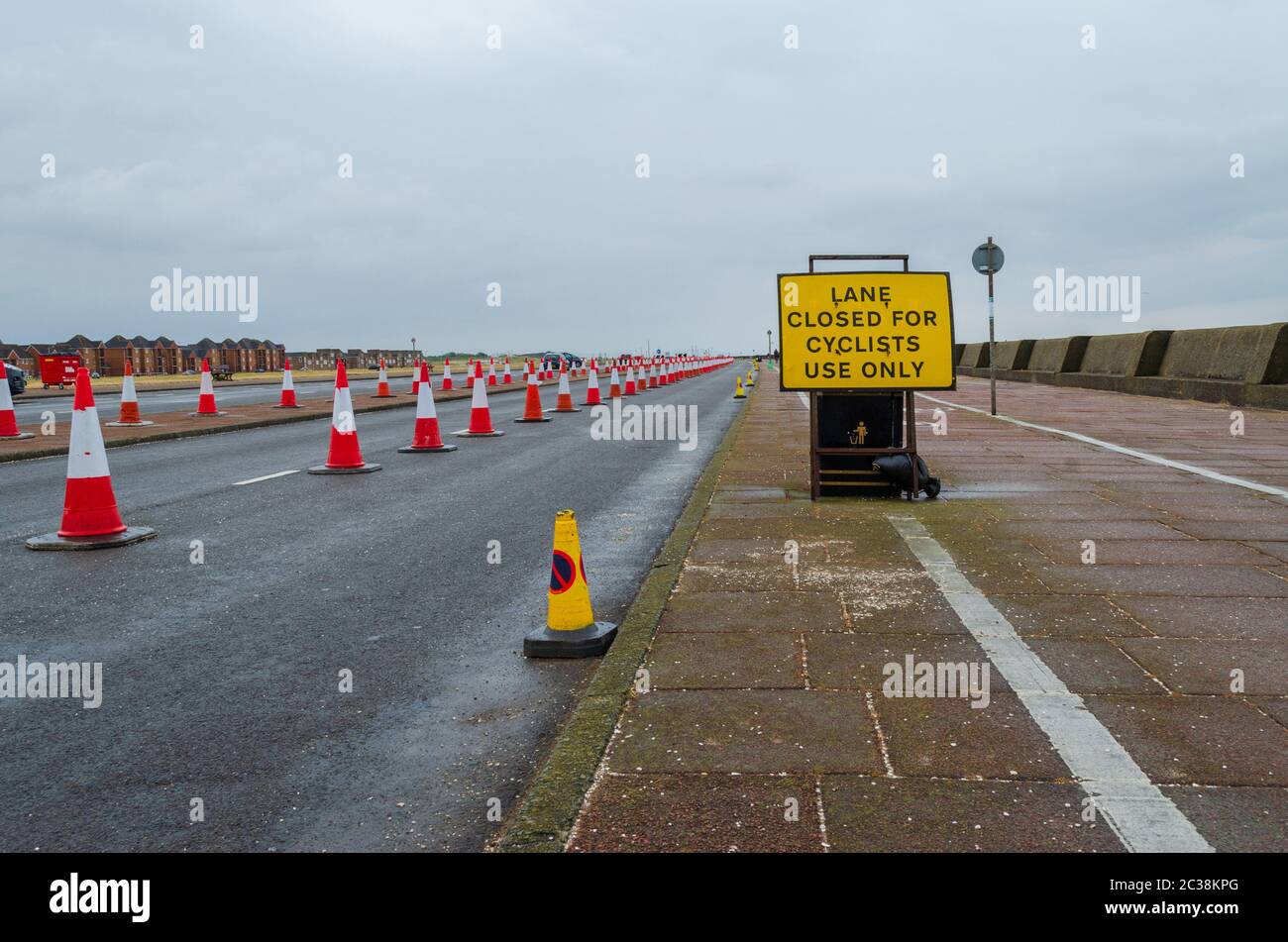 New Brighton, UK: Jun 11, 2020: One lane of the dual carriageway of New Brighton promenade has been closed using traffic cones. This is to allow socia Stock Photo