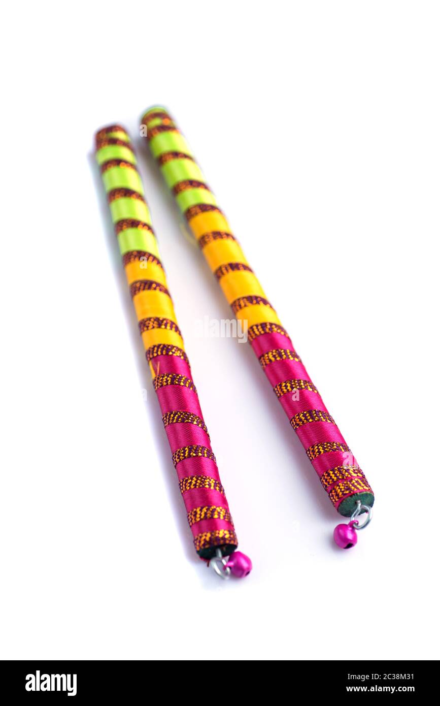 Dandiya sticks on a white background. Raas Garba or Dandiya Raas is the  traditional folk dance form the state of Gujarat \u0026 Rajasthan in India Stock  Photo - Alamy, image size:867x1390