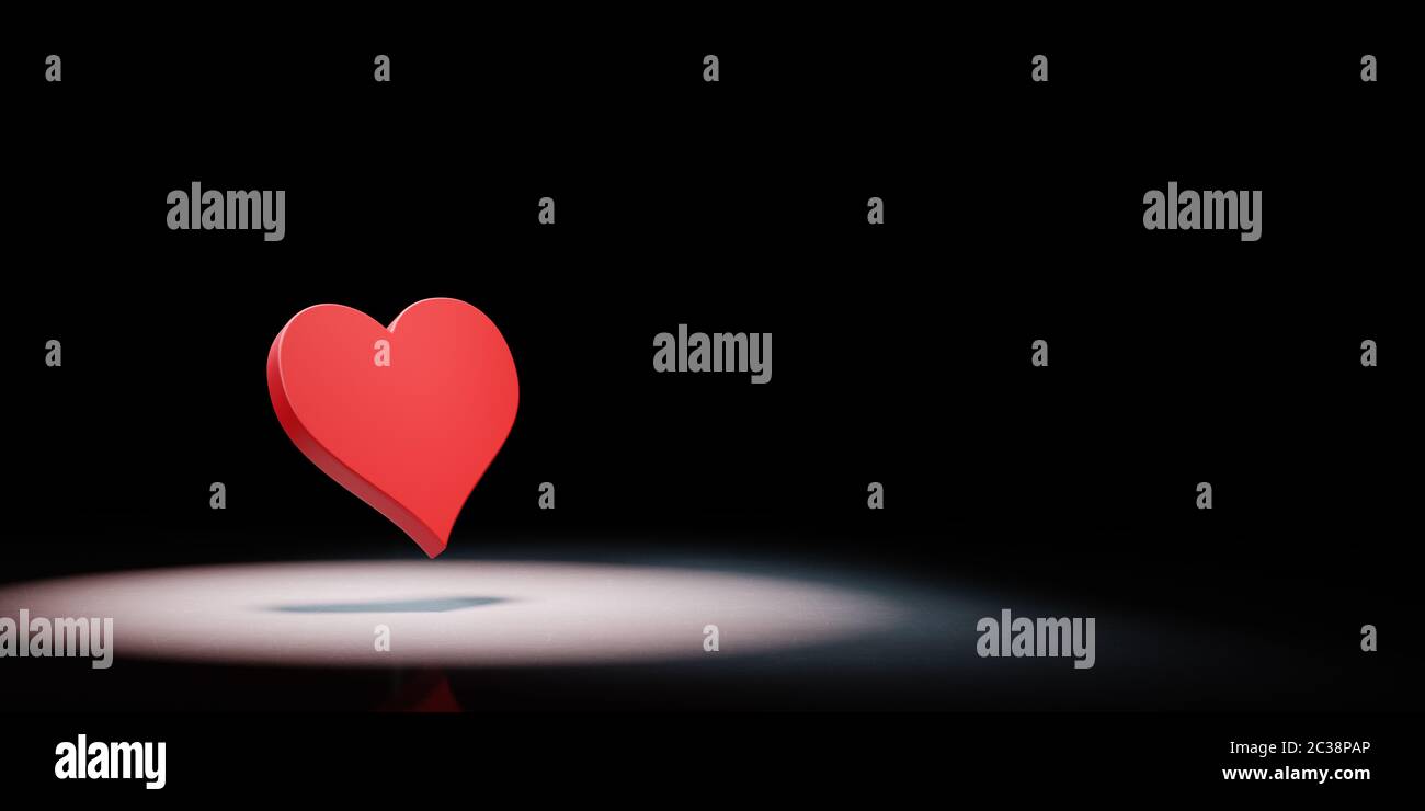 Red Heart Symbol Shape Spotlighted on Black Background with Copy Space ...
