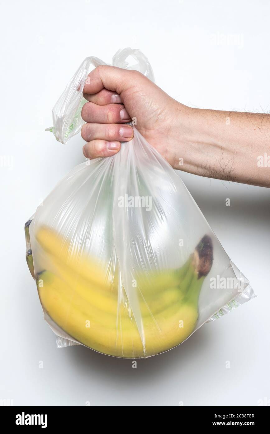 Some bananas in a plastic bag Stock Photo Alamy