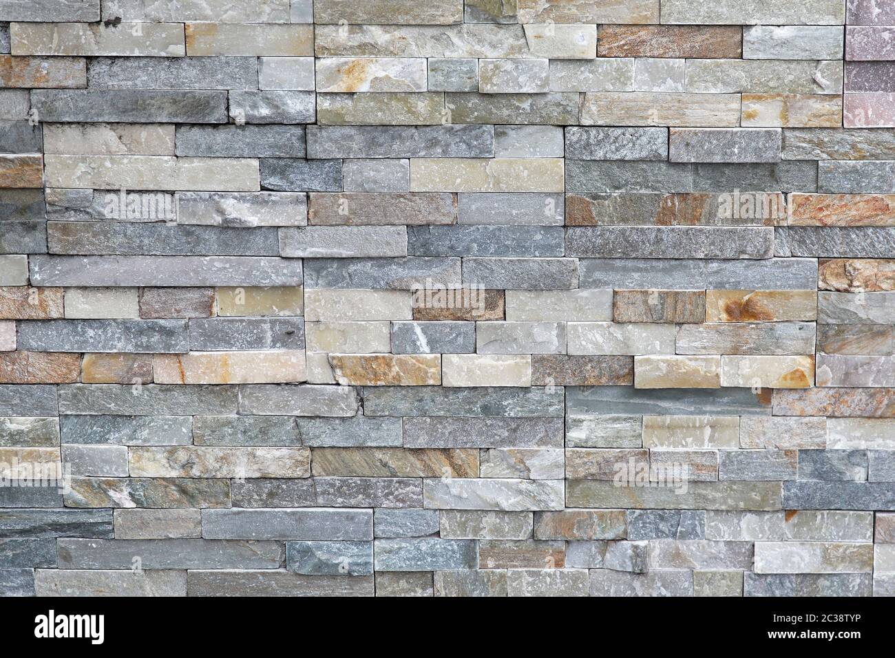 Small tiles made from natural granite stone Stock Photo - Alamy